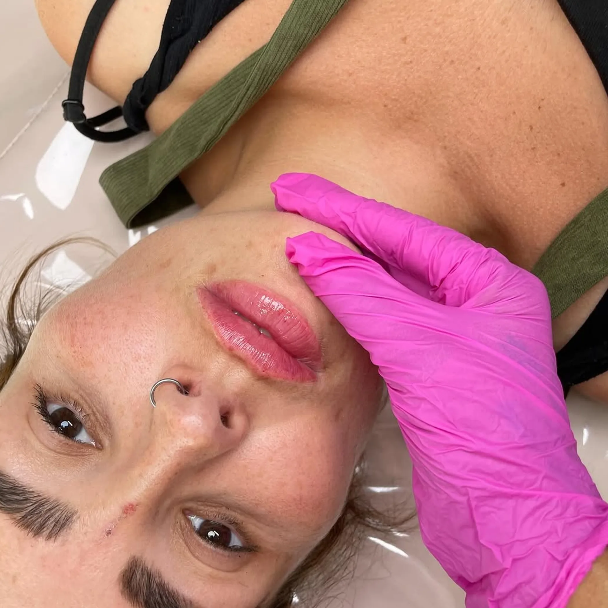 close up cosmetic lip tattoo needle