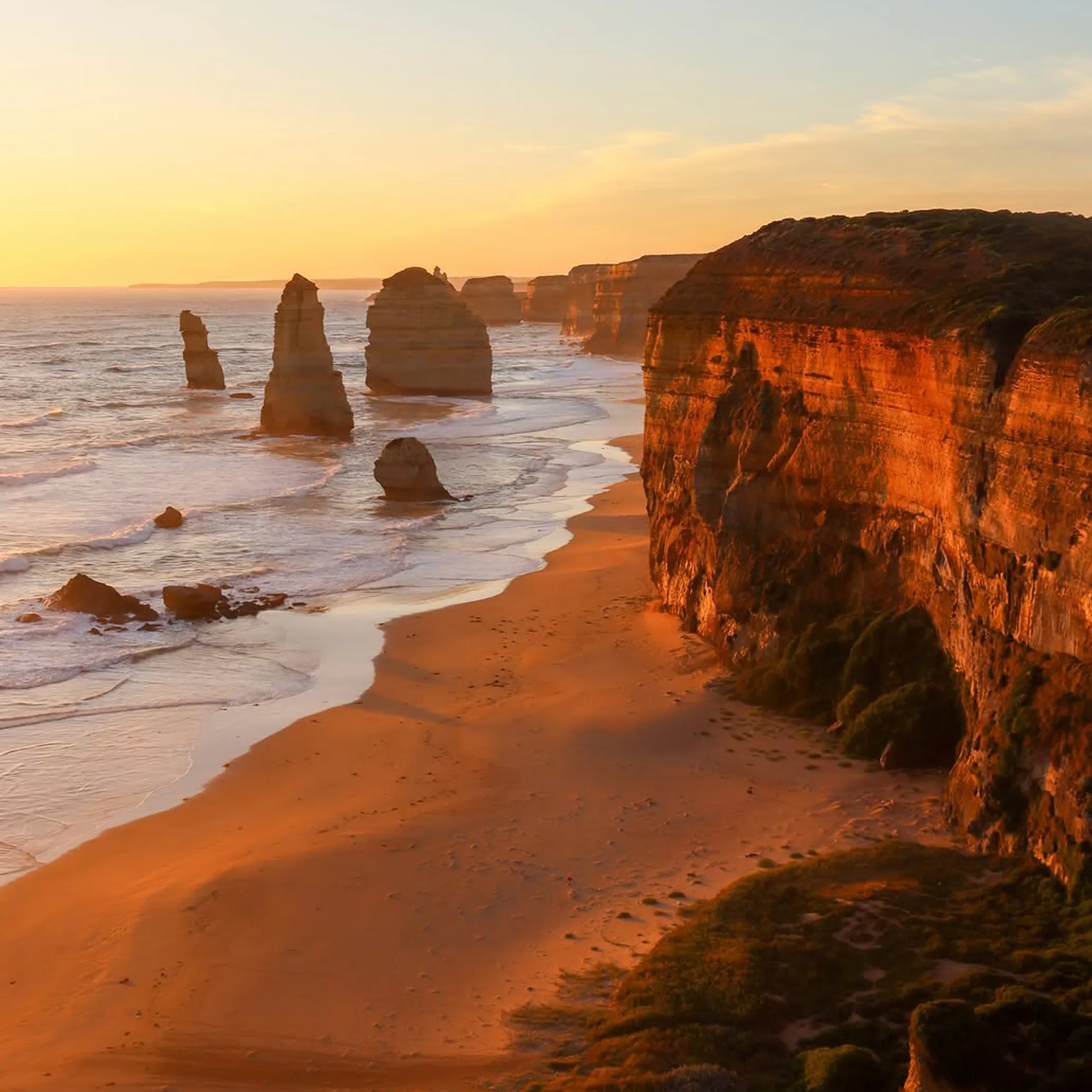 sunset over great ocean road rocks